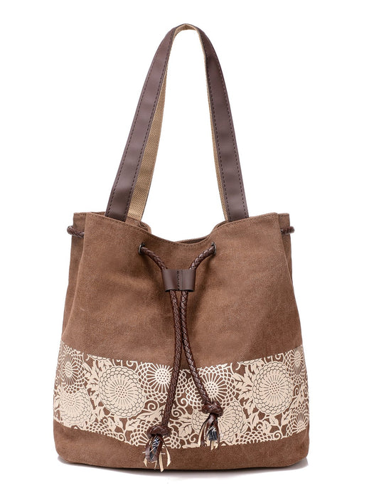 Lightweight canvas hobo bag that blends everyday ease with effortless style.