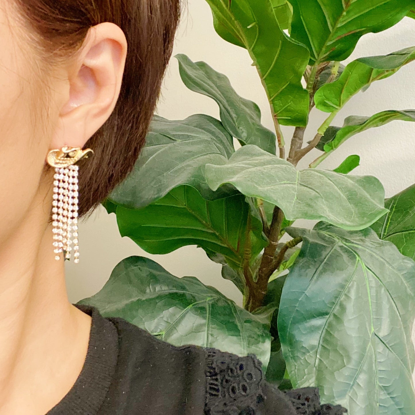 Sparkly cowboy hat fringe earrings that bring bold Western glam to any look.